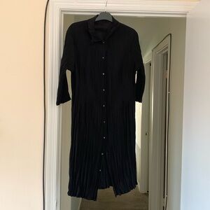 Babette black jacket-dress on snaps.Pleated, great for travel, dressy-casual.